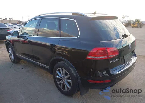 2014 Volkswagen Touareg 3.6L Sport z USA, uszkodzony, nr VIN WVGEF9BP2ED002282